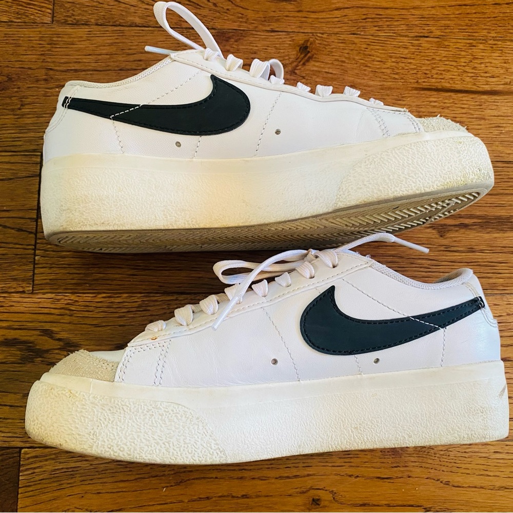 Nike Women's White Sneakers with Black Swoosh
